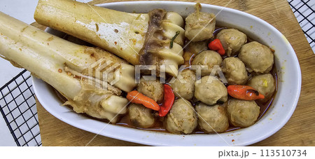 Delicious Indonesian meatballs with huge bones contains bone marrow in spicy beef broth and chilies Delicious Indonesian meatballs with huge bones contains bone marrow in spicy beef broth and chilies 113510734