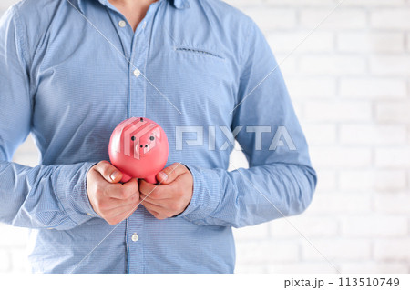 Businessman protecting his savings Businessman protecting his savings 113510749