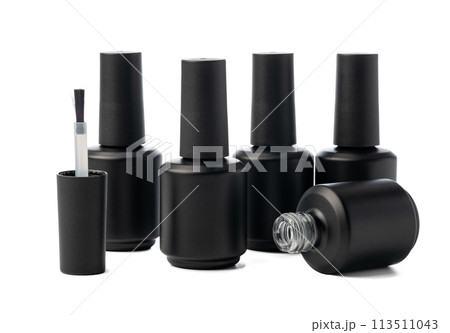 Black bottle of nail polish isolated on white background Black bottle of nail polish isolated on white background 113511043
