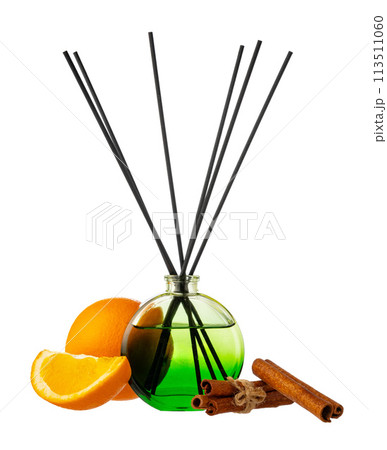 Aromatic diffuser with orange and cinnamon scent on white background Aromatic diffuser with orange and cinnamon scent on white background 113511060