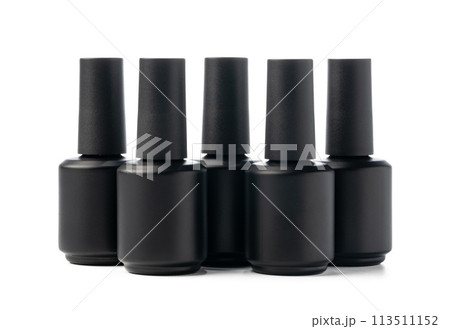 Black bottle of nail polish isolated on white background 113511152