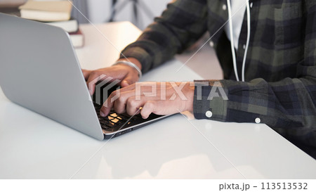 Keyboard typing. Remote job. Internet communication. Business man hands working at modern laptop texting email message at desk office workplace. Keyboard typing. Remote job. Internet communication. Business man hands working at modern laptop texting email message at desk office workplace. 113513532