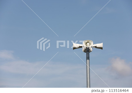 Horn speaker with blue sky background 113516464