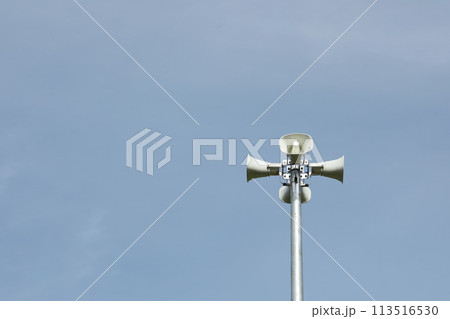 Horn speaker in the park with blue sky background. 113516530
