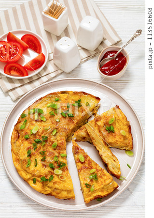 spanish potato omelette tortilla espanola on plate 113516608