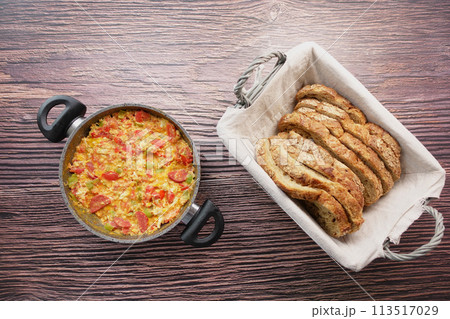Turkish Menemen omelet in a frying pan. . Turkish Menemen omelet in a frying pan. . 113517029