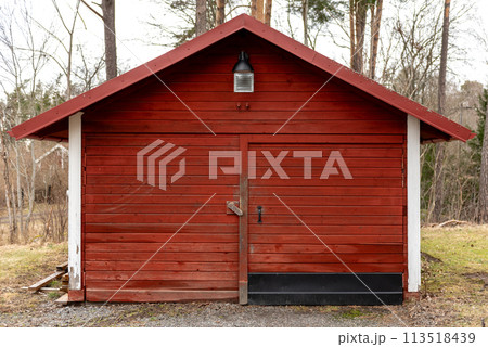 Landscape. Red small traditional wooden building in Sweden. Landscape. Red small traditional wooden building in Sweden. 113518439