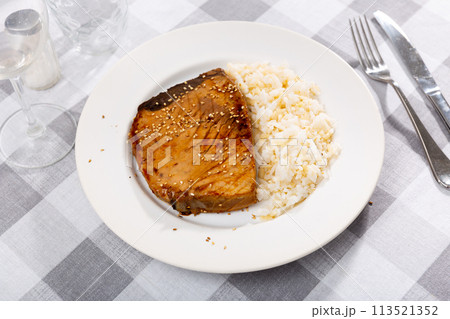 Seared tuna steak with unagi sauce and sesame served with rice 113521352
