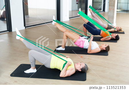Group of women doing stretch exercises 113521353