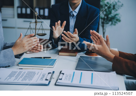 Business people clapping and applause at meeting or conference, close-up of hands. Group of unknown businessmen and women in modern white office. Success teamwork or corporate coaching concept Business people clapping and applause at meeting or conference, close-up of hands. Group of unknown businessmen and women in modern white office. Success teamwork or corporate coaching concept 113524507