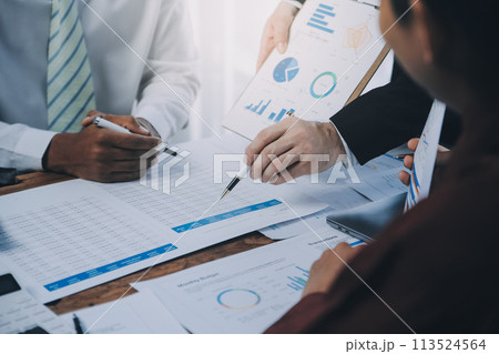 Business team working with new startup project plan and discussion information for financial strategy with laptop and digital tablet in a modern business lounge. 113524564