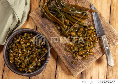 Chilean Australin peruvian seaweed COCHAYUYO. Choped cooked cochayuyo in bowl 113525327