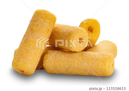 Side view pile of crispy roller corn snack isolated on white background. Side view pile of crispy roller corn snack isolated on white background. 113526613