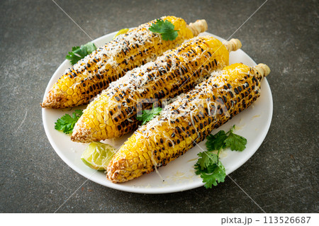 barbecue and grilled corn with cheese and lime barbecue and grilled corn with cheese and lime 113526687