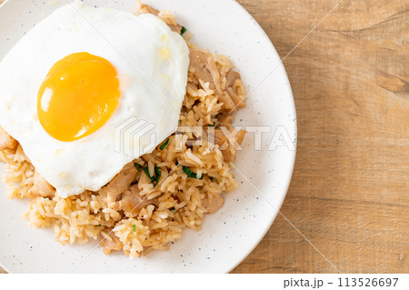 fried rice with pork and fried egg in Japanese style fried rice with pork and fried egg in Japanese style 113526697