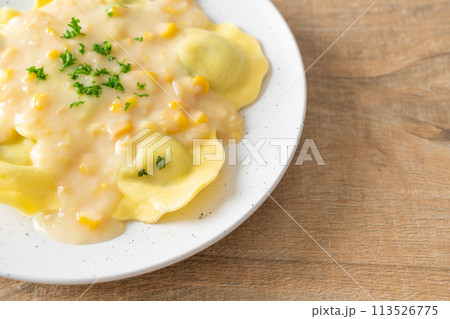 ravioli pasta with corn cheese sauce ravioli pasta with corn cheese sauce 113526775