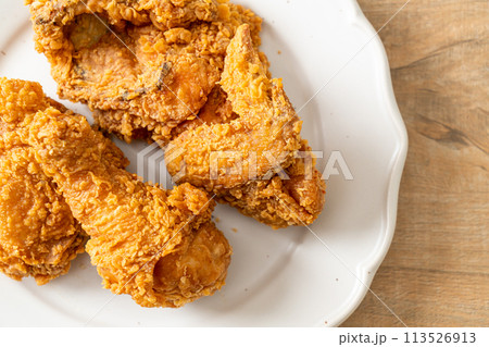 fried chicken with ketchup on plate 113526913
