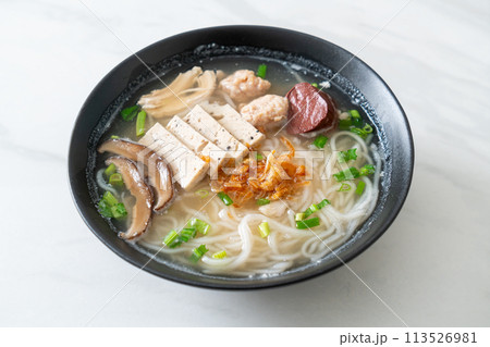 Vietnamese Rice Noodles Soup with Vietnamese Sausage served vegetables and crispy onion Vietnamese Rice Noodles Soup with Vietnamese Sausage served vegetables and crispy onion 113526981