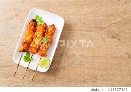 grilled chicken skewer with herbs and spices 113527143