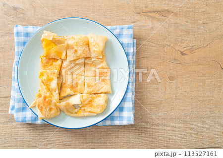 roti with egg and sweetened condensed milk 113527161