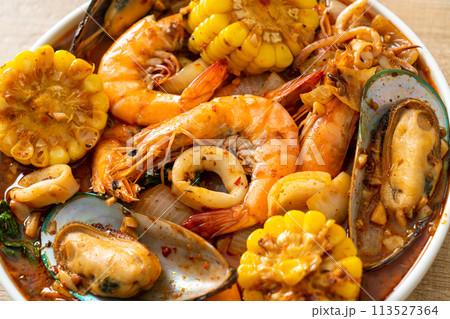 spicy barbecue seafood - shrimps, sqiud, mussel spicy barbecue seafood - shrimps, sqiud, mussel 113527364