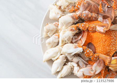 Steamed blue crab with spicy seafood sauce Steamed blue crab with spicy seafood sauce 113527986