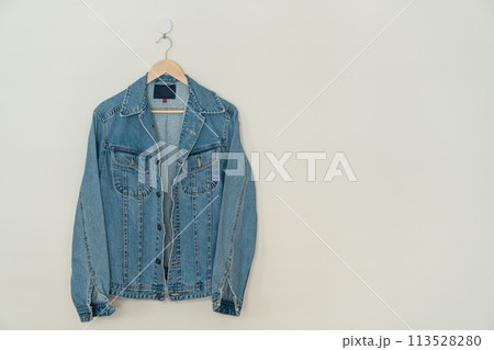 jacket jean hanging with wood hanger jacket jean hanging with wood hanger 113528280