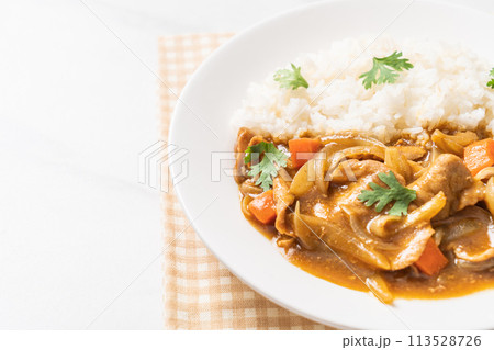 Japanese curry rice with sliced pork, carrot and onions Japanese curry rice with sliced pork, carrot and onions 113528726