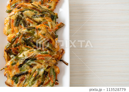 Pajeon or Korean pancake or Korean pizza 113528779