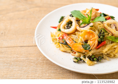 stir fried spicy noodles with sea food stir fried spicy noodles with sea food 113528982