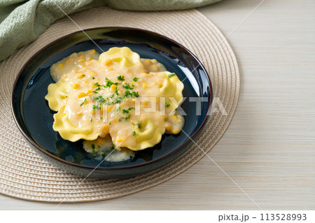 ravioli pasta with corn cheese sauce ravioli pasta with corn cheese sauce 113528993