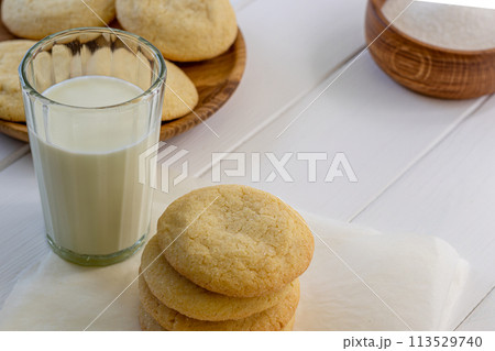 Delicious sugar cookies on wooden table, closeup Delicious sugar cookies on wooden table, closeup 113529740