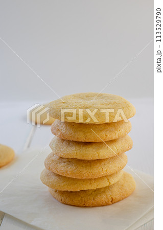 Delicious sugar cookies on wooden table, closeup 113529790