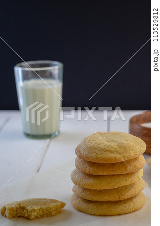 Delicious sugar cookies on wooden table, closeup Delicious sugar cookies on wooden table, closeup 113529812