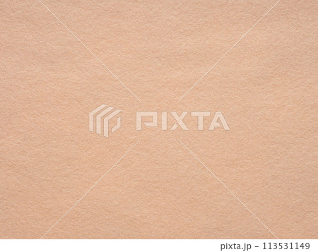 Soft peach felt texture exudes warmth and simplicity, perfect for creating a subtle and inviting atmosphere 113531149