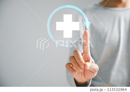 A businessman hand touches a virtual plus sign, denoting positivity. Conveys concepts of increased benefits, forward thinking, and a positive mindset. Business and success symbol. positive thing A businessman hand touches a virtual plus sign, denoting positivity. Conveys concepts of increased benefits, forward thinking, and a positive mindset. Business and success symbol. positive thing 113532964