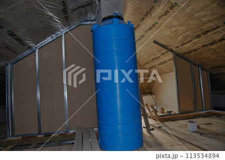 Storage tank for drinking water. A tank for 700 litres of water is located in the attic. 113534894