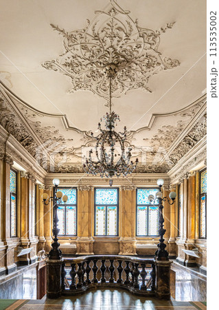 Wooden old decorative balusters, Ancient wooden stairs. decorative railings carved from wood 113535002