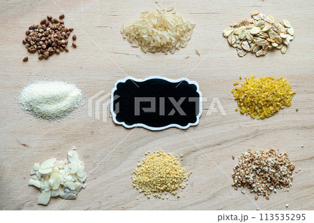 Assorted cereal grain porridge seeds set on a wooden background 113535295