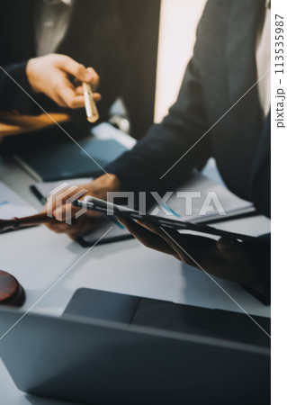 Businessman and Male lawyer or judge consult having team meeting with client, Law and Legal services concept. Businessman and Male lawyer or judge consult having team meeting with client, Law and Legal services concept. 113535987