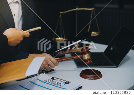 Businessman and Male lawyer or judge consult having team meeting with client, Law and Legal services concept. Businessman and Male lawyer or judge consult having team meeting with client, Law and Legal services concept. 113535989