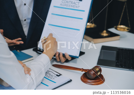 Businessman and Male lawyer or judge consult having team meeting with client, Law and Legal services concept. Businessman and Male lawyer or judge consult having team meeting with client, Law and Legal services concept. 113536016