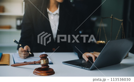 Businessman and Male lawyer or judge consult having team meeting with client, Law and Legal services concept. Businessman and Male lawyer or judge consult having team meeting with client, Law and Legal services concept. 113536030