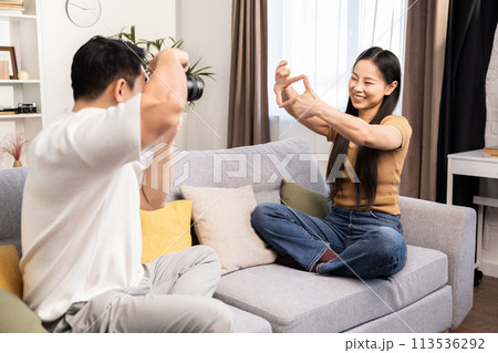 Casual Indoor Photo Shoot with a Young Couple Casual Indoor Photo Shoot with a Young Couple 113536292