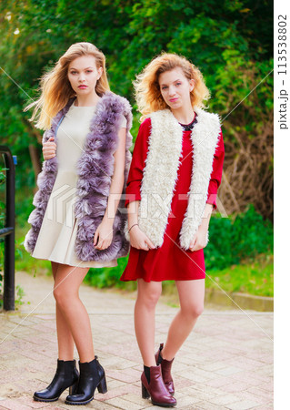 Two fashionable women outdoor 113538802