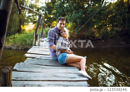 Couple in love enjoying tender moments during sunset . Emotional concept of relationship. 113539249