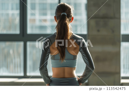 Rear view young woman with muscular body. Fitness concept. 113542475