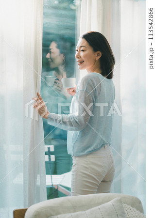 a forty-something woman a forty-something woman 113542866