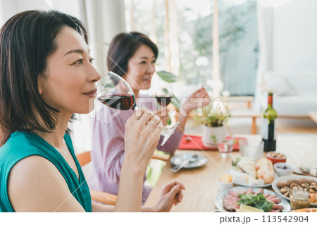 a forty-something woman a forty-something woman 113542904