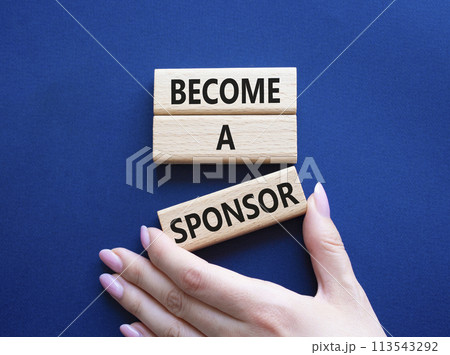 Become a sponsor symbol. Concept word Become a sponsor on wooden blocks. Businessman hand. Beautiful deep blue background. Business and Become a sponsor concept. Copy space 113543292